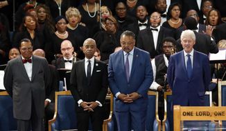 Louis Farrakhan, from left, Rev. Al Sharpton, Rev. Jesse Jackson and former President Bill Clinton attend the funeral service for Aretha Franklin at Greater Grace Temple, Friday, Aug. 31, 2018, in Detroit. Franklin died Aug. 16, 2018 of pancreatic cancer at the age of 76. (AP Photo/Paul Sancya)