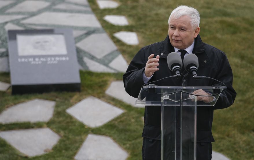 FILE - In this Friday, April 6, 2018 file photo, Jaroslaw Kaczynski, the leader of Poland's ruling party, Law and Justice, speaks during the inauguration of a memorial for the Smolensk plane crash, in Budapest, Hungary. Poland said Friday, Aug. 31 it lost over 5 million citizens and over $54 billion dollars (46.6 billion euros) worth of assets under the Nazi German occupation of the country during World War II. A parliamentary commission announced the numbers, saying they are preliminary, as part of the current Polish government’s declared intent to seek damages from Germany. Ruling party leader Jaroslaw Kaczynski argues that Poland was the first to be attacked Sept. 1, 1939, to put up resistance and that it suffered the greatest losses. (AP Photo/Darko Vojinovic, file)