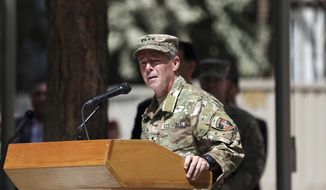 U.S. Army Gen. Austin Scott Miller speaks during the change of command ceremony at Resolute Support headquarters in Kabul, Afghanistan, Sunday, Sept. 2, 2018. Miller assumed command of the 41-nation NATO mission in Afghanistan following a handover ceremony. (AP Photo/Massoud Hossaini)