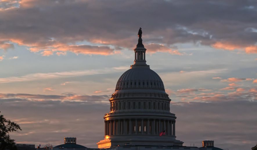 FILE - In this June 20, 2017, file photo, the U.S. Capitol in Washington at sunrise. Keep the government running and confirm Brett Kavanaugh as the next Supreme Court justice. Those are the big-ticket items that Republican leaders in Congress hope to accomplish as lawmakers look to wrap up their work in 2018 and head home to campaign for the November elections.  (AP Photo/J. Scott Applewhite, File)