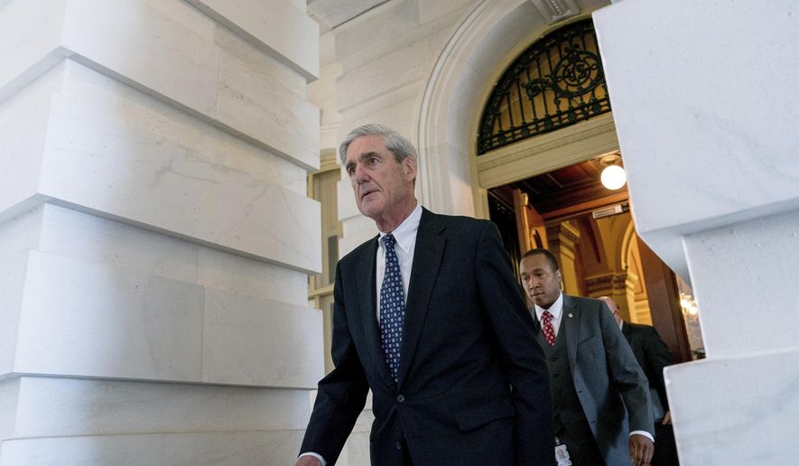 In this June 21, 2017, file photo, former FBI Director Robert Mueller, the special counsel probing Russian interference in the 2016 election, departs Capitol Hill following a closed door meeting in Washington. (AP Photo/Andrew Harnik)