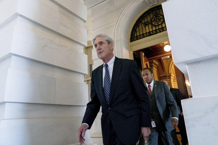 In this June 21, 2017, file photo, former FBI Director Robert Mueller, the special counsel probing Russian interference in the 2016 election, departs Capitol Hill following a closed-door meeting in Washington. (AP Photo/Andrew Harnik)