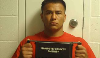 This photo provided by the Sanpete County Jail in Manti, Utah, shows Ruben Hernandez. Prosecutors say Hernandez, an Idaho prison inmate sent to help fight a wildfire, raped a woman who was also working to support firefighters in Utah. Sanpete County Attorney Kevin Daniels said Tuesday, Sept. 4, 2018, the woman had rejected several advances from Hernandez before the Aug. 29 assault. Hernandez was charged with felony rape. (Sanpete County Jail via AP)