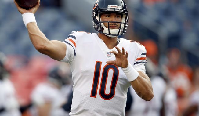 FILE - In this Saturday, Aug. 18, 2018, file photo, Chicago Bears quarterback Mitchell Trubisky (10) warms up prior to a preseason NFL football game against the Denver Broncos in Denver. As the Chicago Bears prepare for a primetime season opener against Aaron Rodgers and the rival Green Bay Packers, quarterback Mitchell Trubisky sees a team with no limits. The Bears come into the matchup at Lambeau Field on Sunday night, Sept. 9, 2018 with a decidedly different outlook after changing coaches, overhauling the receivers group and pulling off a huge trade last weekend to add two-time All-Pro Khalil Mack to their defense. (AP Photo/David Zalubowski, File)