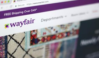FILE- This April 17, 2018, file photo shows the Wayfair website on a computer in New York. online retailers are trying hard to get more people to buy stoves, washing machines and other large appliances without seeing them in person. Wayfair, for example, signed a deal last year to sell GE appliances on its site. (AP Photo/Jenny Kane)