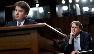 President Donald Trump&#39;s Supreme Court nominee, Brett Kavanaugh, left, accompanied by White House counsel Don McGahn, right, testifies before the Senate Judiciary Committee on Capitol Hill in Washington, Wednesday, Sept. 5, 2018, for the second day of his confirmation to replace retired Justice Anthony Kennedy. (AP Photo/Andrew Harnik)