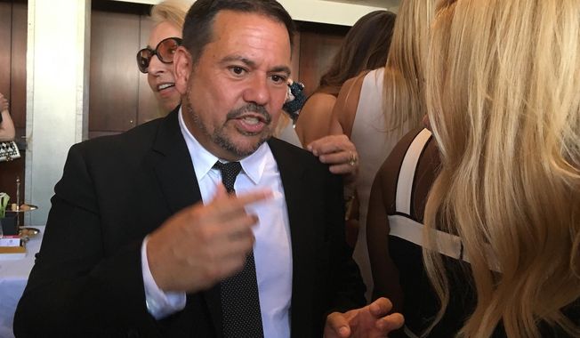 Fashion designer Narciso Rodriguez appears at a luncheon honoring him with the 2018 Couture Council Award for Artistry of Fashion, Wednesday, Sept. 5, 2018 in New York. (AP Photo/Jocelyn Noveck)
