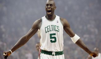 FILE - In this May 6, 2008, file photo, Boston Celtics&#x27; Kevin Garnett gestures to the crowd just before tipoff in Game 1 of an NBA Eastern Conference semifinal basketball series against the Cleveland Cavaliers in Boston. Kevin Garnett is suing an accountant and his firm, alleging they helped a wealth manager steal $77 million from the retired NBA star.  (AP Photo/Winslow Townson, File)