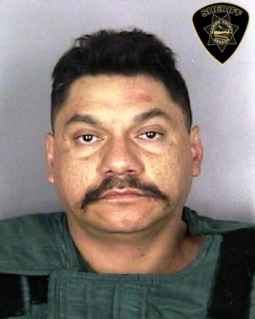 This Aug. 19, 2018, booking photo released by the Marion County Sheriff's Office shows inmate, Eduardo de la Lima Vargas, at the Marion County Jail (MCJ) in Salem, Ore. The Mexican man who federal authorities say is illegally in America allegedly ran a red light while drunk and crashed into a motorcycle carrying a man and woman, killing them both. On Wednesday, Sept. 5 a judge set bail for de la Lima Vargas at a half-million dollars, saying he's a threat to society and a flight risk. He was sent back to the Marion County jail, joining the hundreds of foreigners in jails and prisons in Oregon who federal immigration authorities believe are deportable. (S Griffith/Marion County Sheriff's Office via AP)