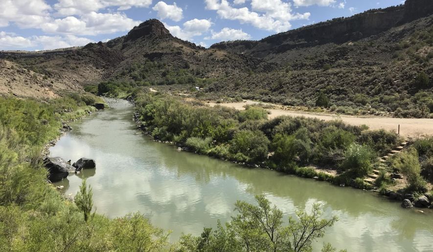 This August 2018 photo shows the Taos Gorge in New Mexico. Hikers have embarked on a 500-mile (805-kilometer) expedition that will traverse New Mexico. The mission: Chart out the best route and identify what challenges might lay ahead as the state moves closer to establishing the Rio Grande Trail. Following in the footsteps of other states, New Mexico is looking to capitalize on its vistas, mild weather and culture with the creation of a long-distance trail along one of North America's longest rivers. (AP Photo/Susan Montoya Bryan)