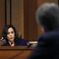 Sen. Kamala Harris, D-Calif., left, questions President Donald Trump&#39;s Supreme Court nominee, Brett Kavanaugh, in the evening of the second day of his Senate Judiciary Committee confirmation hearing, Wednesday, Sept. 5, 2018, on Capitol Hill in Washington, to replace retired Justice Anthony Kennedy. (AP Photo/Jacquelyn Martin)