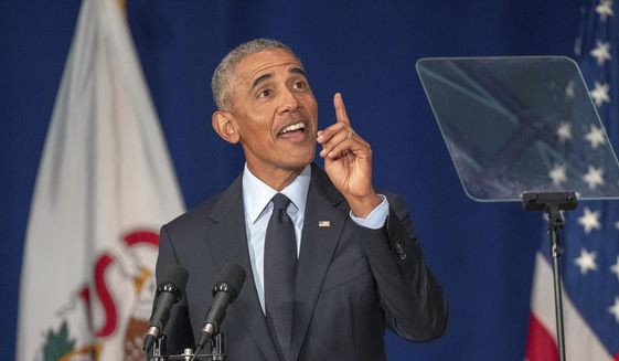 Former President Barack Obama speaks in Foellinger Auditorium on the University of Illinois campus in Urbana, Ill., on Friday, Sept. 7, 2018. Obama will receive a medal for the Paul H. Douglas Award for Ethics in Government at a private ceremony following the speech. (Stephen Haas//The News-Gazette via AP)
