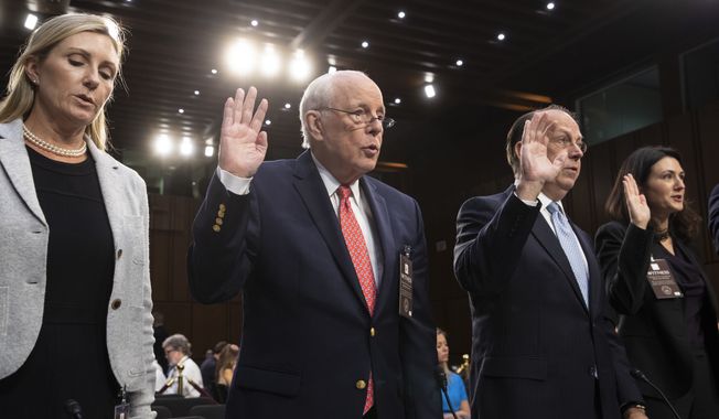 A panel of experts and character witnesses is sworn in before the Senate Judiciary Committee during the final stage of the confirmation hearing for President Donald Trump&#x27;s Supreme Court nominee, Brett Kavanaugh, on Capitol Hill in Washington, Friday, Sept. 7, 2018. From left are, real estate agent Monica Mastal, John Dean, former counsel to President Richard M. Nixon, Paul Clement, former solicitor general. (AP Photo/J. Scott Applewhite)