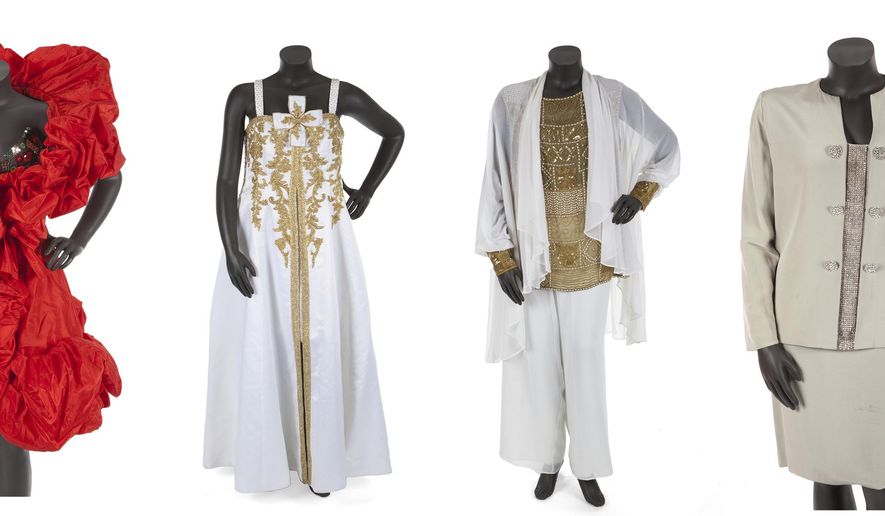 This combination of photos released by Julien's Auctions shows various outfits belonging to the late singer Aretha Franklin. More than 30 dresses and accessories worn on stage by Aretha Franklin are going up for auction on Nov. 10. The items will go on display between Nov. 5 and Nov. 9. at the Hard Rock Cafe in New York. (Julien's Auctions via AP)