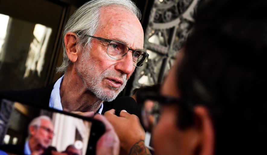 Italian architect Renzo Piano talks with journalists after a meeting about the Morandi highway bridge, which collapsed on Aug. 14 killing 43 people, in Genoa, Italy, Tuesday, Aug. 28, 2018. Piano, 80, said he had been in Geneva on August 14 when the Morandi Bridge collapsed, "and since then I've been thinking of nothing else". Piano said "the bridge is a theme that touches all the chords: from technology to poetics". (Simone Arveda/ANSA via AP)
