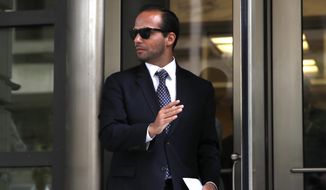 Former Donald Trump presidential campaign foreign policy adviser George Papadopoulos, who triggered the Russia investigation, and who pleaded guilty to one count of making false statements to the FBI, leaves federal court after he was sentenced to fourteen days in prison, Friday, Sept. 7, 2018, in Washington. (AP Photo/Jacquelyn Martin)