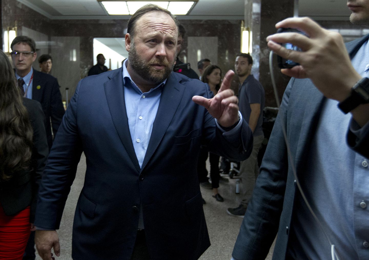 Alex Jones might return to Musks X if poll says yes