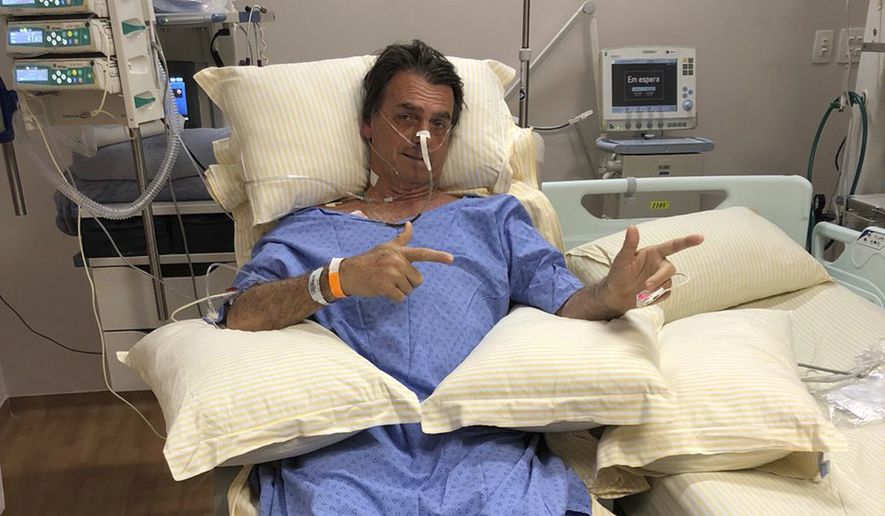 Jair Bolsonaro suffered intestinal damage and serious internal bleeding when he was stabbed Thursday during a campaign event. (Associated Press)