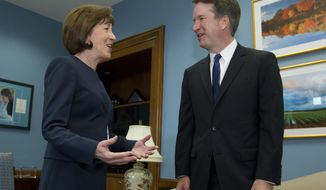 Sen. Susan Collins, Maine Republican, speaks with Supreme Court nominee Judge Brett Kavanaugh at her office, before a private meeting on Capitol Hill in Washington. The end of contentious confirmation hearings for U.S. Supreme Court nominee Kavanaugh is shifting the focus to potential swing votes like Republican Sen. Susan Collins of Maine. (AP Photo/Jose Luis Magana) **FILE**