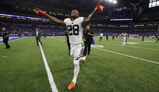 Cincinnati Bengals running back Joe Mixon (28) celebrates as he runs off the field following an NFL football game against the Indianapolis Colts in Indianapolis, Sunday, Sept. 9, 2018. (AP Photo/John Minchillo)