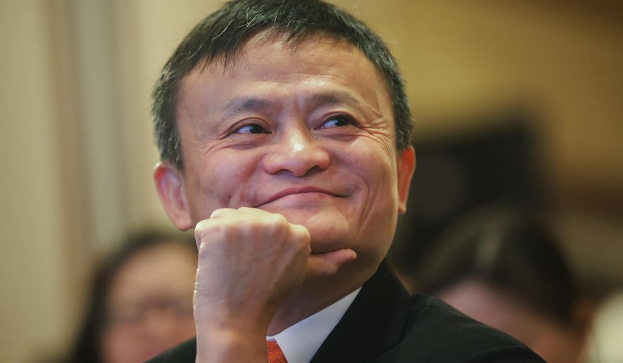 In this June 25, 2018, photo, Jack Ma, chairman of Alibaba Group attends the ceremony to launch a blockchain-base remittance solution in Hong Kong. Jack Ma, who founded e-commerce giant Alibaba Group and helped to launch China&#39;s online retailing boom, announced Monday, Sept. 10, 2018 that he will step down as the company&#39;s chairman next September. In a letter released by Alibaba, Ma said he will be succeeded by CEO Daniel Zhang. Ma handed over the CEO&#39;s post to Zhang in 2013 as part of what he said was a succession process developed over a decade. (Chinatopix via AP)