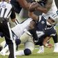 Dallas Cowboys&#39; Dak Prescott (4) is sacked by Carolina Panthers&#39; Kawann Short (99) during the second half of an NFL football game in Charlotte, N.C., Sunday, Sept. 9, 2018. (AP Photo/Mike McCarn)