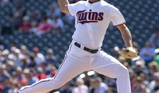 Minnesota starting pitcher Chase De Jong delivers during the first inning of a baseball game against the Kansas City Royals, Sunday, Sept. 9, 2018, in Minneapolis. (AP Photo/Paul Battaglia)