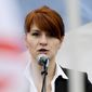 Maria Butina, leader of a pro-gun organization in Russia, speaks to a crowd during a rally in support of legalizing the possession of handguns in Moscow, Russia. Federal prosecutors concede that they misinterpreted text messages when they alleged that Butina, a Russian woman accused of working as a secret agent traded sex for access. Prosecutors acknowledged the mistake in a court filing in the case of Butina, charged with working as a covert agent and trying to establish back-channel lines of communication to the Kremlin. (AP Photo/File)