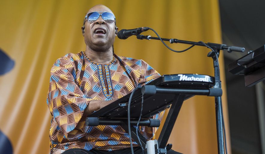 FILE - In this May 6, 2017, file photo, Stevie Wonder performs at the New Orleans Jazz and Heritage Festival in New Orleans. Matt Damon, Tracee Ellis Ross, Jon Hamm and Winona Ryder were among the stars participating in the Friday, Sept. 7, 2018, Stand Up To Cancer telecast. Musical performers included Stevie Wonder, Little Big Town and Charlie Wilson, a cancer survivor. (Photo by Amy Harris/Invision/AP, File)