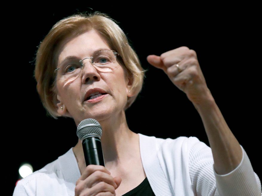 In this Wednesday, Aug. 8, 2018, file photo, U.S. Sen. Elizabeth Warren, D-Mass., speaks during a town hall style gathering in Woburn, Mass. (AP Photo/Charles Krupa, File)
