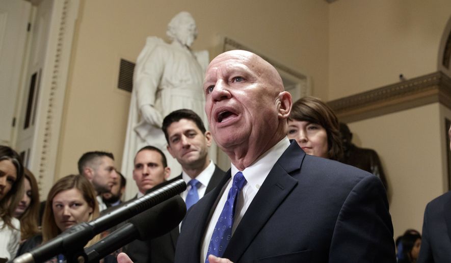 House Ways and Means Committee Chairman Kevin Brady, R-Texas, steward of the GOP tax bill, flanked by Speaker of the House Paul Ryan, R-Wis., left, and Rep. Cathy McMorris Rodgers, R-Wash., right, speaks after passing the Republican tax reform bill in the House of Representatives, on Capitol Hill, in Washington, Tuesday, Dec. 19, 2017. (AP Photo/J. Scott Applewhite) ** FILE **