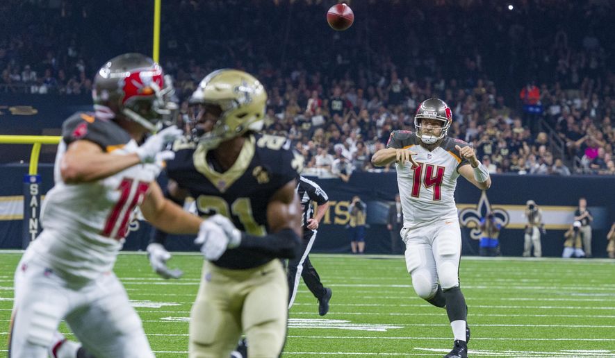 Tampa Bay Buccaneers quarterback Ryan Fitzpatrick throws a pass during an NFL football game against the New Orleans in New Orleans Saints, Sunday, Sept. 9, 2018. (Scott Clause/The Daily Advertiser via AP)