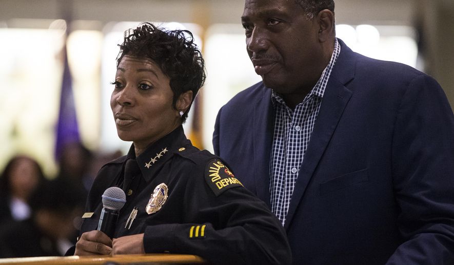 Dallas Police Chief U. Renee Hall and State Senator Royce West listen as people ask questions regarding Botham Shem Jean following an African American Leadership summit on Saturday, Sept. 8, 2018 at Paul Quinn College in Dallas. Jean was shot by a Dallas police officer in his home on Thursday night. (Shaban Athuman/The Dallas Morning News via AP)