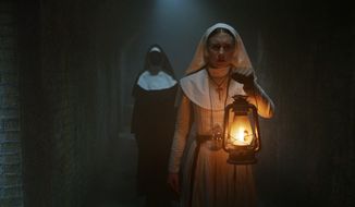 This image released by Warner Bros. Pictures shows Taissa Farmiga in a scene from &amp;quot;The Nun.&amp;quot; (Warner Bros. Pictures via AP)