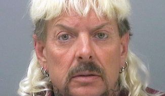 This photo provided by the Santa Rose County Jail in Milton, Fla., shows Joseph Maldonado-Passage, an Oklahoma zookeeper, who was indicted on federal murder-for-hire charges. Carole Baskin, the operator of a Florida-based animal sanctuary, says she was the target of Maldonado-Passage, who goes by the nickname &amp;quot;Joe Exotic.&amp;quot; Maldonado-Passage, who remains jailed in Florida, also ran unsuccessfully for Oklahoma governor as a Libertarian this year. (Santa Rosa County Jail via AP)