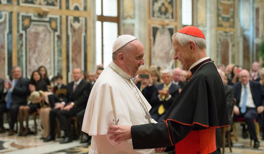 In this April 17, 2015, file photo, Pope Francis, left, talks with Papal Foundation Chairman Cardinal Donald Wuerl, Archbishop of Washington, D.C., during a meeting with members of the Papal Foundation at the Vatican. On Tuesday, Aug. 14, 2018, a Pennsylvania grand jury accused Cardinal Wuerl of helping to protect abusive priests when he was Pittsburgh&#39;s bishop. (L&#39;Osservatore Romano/Pool Photo via AP)