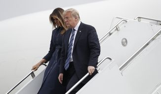 President Donald Trump and first lady Melania Trump arrive at the John Murtha Johnstown-Cambria County Airport in Johnstown, Pa., Tuesday, Sept. 11, 2018. Trump will be speaking during the September 11th Flight 93 Memorial Service in Shanksville, Pa. (AP Photo/Evan Vucci)