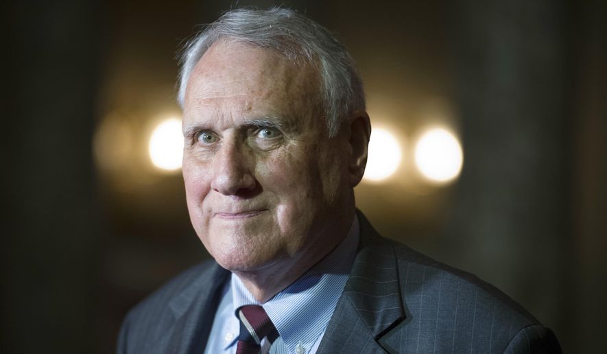 In this Sept. 5, 2018, photo, Sen. Jon Kyl, R-Ariz., waits to be sworn in by Vice President Mike Pence on Capitol Hill, in Washington. (AP Photo/Cliff Owen) ** FILE **