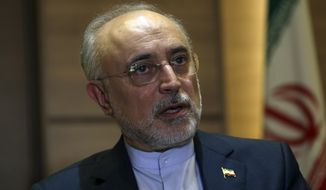 Iran&#39;s nuclear chief Ali Akbar Salehi speaks in an interview with The Associated Press at the headquarters of Iran&#39;s atomic energy agency, in Tehran, Iran, Tuesday, Sept. 11, 2018. Salehi told The Associated Press that he hopes the atomic deal between Tehran and world powers survives, but warns the program will be in a stronger position than ever if not. (AP Photo/Vahid Salemi)