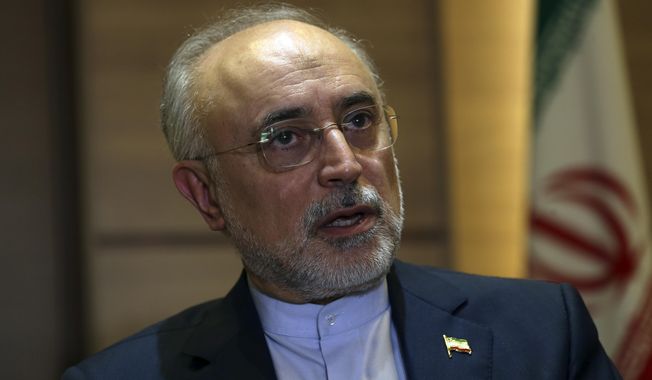 Iran&#x27;s nuclear chief Ali Akbar Salehi speaks in an interview with The Associated Press at the headquarters of Iran&#x27;s atomic energy agency, in Tehran, Iran, Tuesday, Sept. 11, 2018. Salehi told The Associated Press that he hopes the atomic deal between Tehran and world powers survives, but warns the program will be in a stronger position than ever if not. (AP Photo/Vahid Salemi)