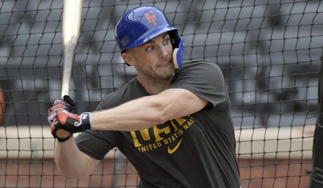 This Sept. 8, 2018 photo shows New York Mets&#x27; David Wright batting during a simulated baseball game in New York. Wright took live batting practice Tuesday, Sept. 11, 2018 at Citi Field as the Mets captain tries to complete his comeback from a string of debilitating injuries. (AP Photo/Bill Kostroun)