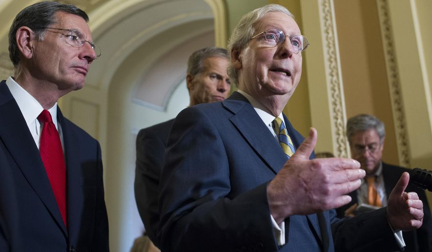 Senate Majority Leader Mitch McConnell of Ky., right, Sen. John Barrasso, R-Wyo., left, Sen. John Thune, R-S.D., center left, speak with reporters after the Republican policy luncheon on Capitol Hill, in Washington, Wednesday, Sept. 5, 2018. (AP Photo/Cliff Owen)