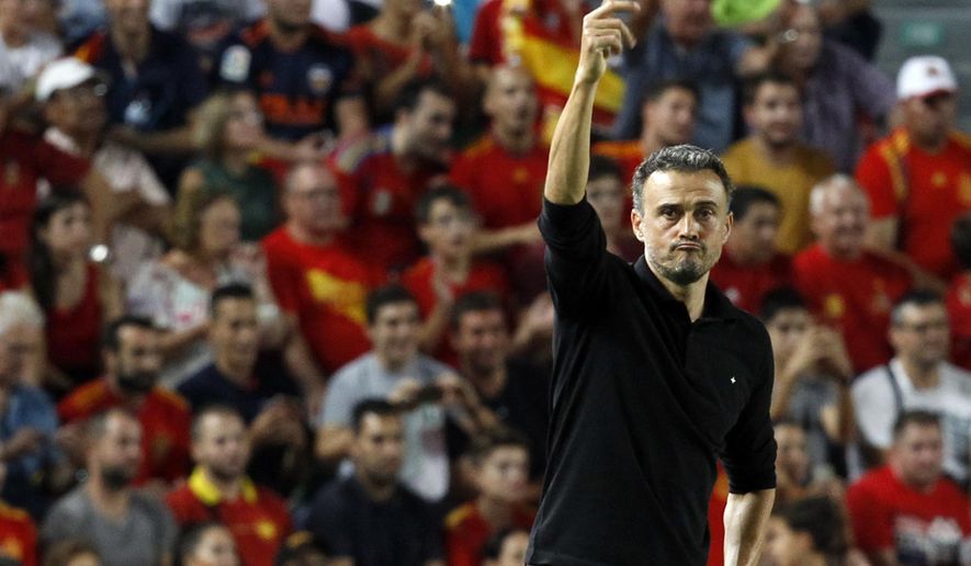 Spain head coach Luis Enrique gives instructions to his players during the UEFA Nations League soccer match between Spain and Croatia at the Manuel Martinez Valero stadium in Elche, Spain, Tuesday Sept. 11, 2018. (AP Photo/Alberto Saiz)