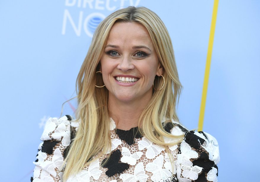 FILE - In this Aug. 6, 2018 file photo, Reese Witherspoon arrives at the Hello Sunshine Video on Demand channel launch in Los Angeles. Witherspoon’s Hello Sunshine and WME Partner announced Tuesday, Sept. 11, that “Together Live,” a ten-city North America tour bringing together women of all ages and backgrounds will launch in Boston on Nov. 3. Leaders, musicians, comedians, celebrities and ordinary people will share real stories from their lives. (Photo by Jordan Strauss/Invision/AP, File)