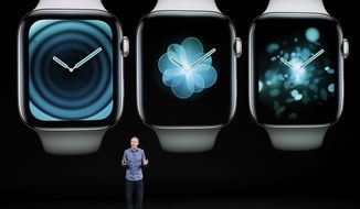 Jeff Williams, Apple&#39;s chief operating officer, speaks about the Apple Watch Series 4 at the Steve Jobs Theater during an event to announce new Apple products Wednesday, Sept. 12, 2018, in Cupertino, Calif. (AP Photo/Marcio Jose Sanchez)