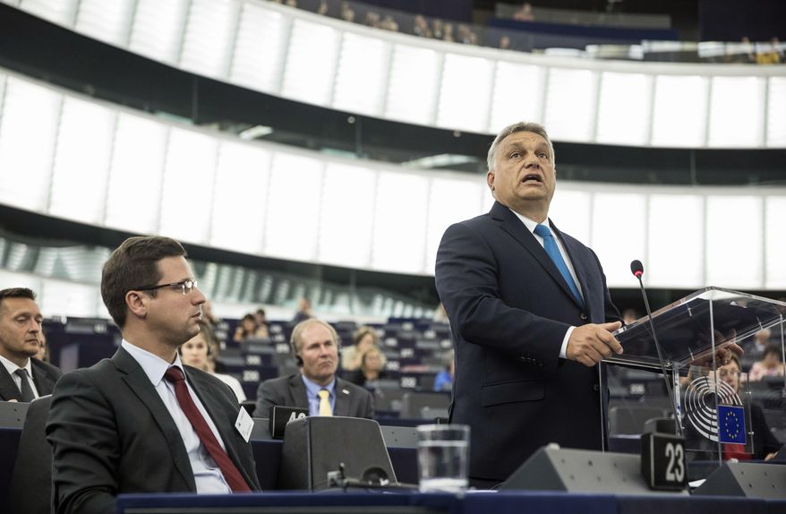 Hungary&#39;s Prime Minister Viktor Orban delivers his speech at the European Parliament in Strasbourg, eastern France, Tuesday Sept.11, 2018. The European Parliament debates whether Hungary should face political sanctions for policies that opponents say are against the EU&#39;s democratic values and the rule of law. (AP Photo/Jean-Francois Badias)