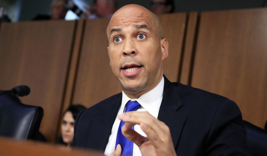 In this Sept. 4, 2018, photo, Senate Judiciary Committee member Sen. Cory Booker, D-N.J. speaks during the committee&#39;s Supreme Court nominee Brett Kavanaugh&#39;s nominations hearing on Capitol Hill in Washington. Bookerhas released a new batch of &amp;quot;committee confidential&amp;quot; documents about Kavanaugh, even after a conservative judicial group referred his earlier disclosures to the Senate Ethics Committee. The documents released Sept. 12 show Kavanaugh&#39;s involvement in President George W. Bush-era judicial nominations, including some that were controversial. Judicial Watch wants the Ethics Committee to investigate as a possible violation of Senate rules. (AP Photo/Manuel Balce Ceneta)