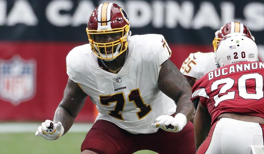 FILE - In this Sept. 9, 2018, file photo, Washington Redskins offensive tackle Trent Williams (71) is shown in action during an NFL football game against the Arizona Cardinals, in Glendale, Ariz. A franchise known for the &amp;quot;Hogs&amp;quot; offensive line from the Super Bowl era, the Washington Redskins might have another season-altering group in the trenches this season. Led by left tackle Trent Williams, Washington&#39;s &amp;quot;Hogs 2.0&amp;quot; offensive line is a dream to play behind for running back Adrian Peterson and quarterback Alex Smith. (AP Photo/Rick Scuteri, File)