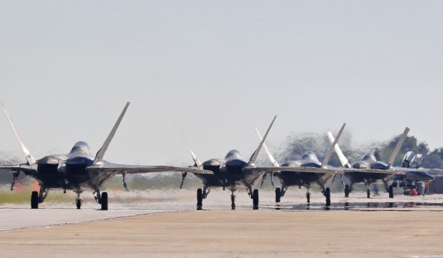 F-22s taxi down the runway as they prepare to depart Langley Air Force Base, Va., Tuesday morning, Sept. 11, 2018, as Hurricane Florence approaches the Eastern Seaboard. Officials from Joint Base Langley-Eustis in Hampton said the base&#x27;s F-22 Raptors and T-38 Talon training jets, as a precaution, were headed for Rickenbacker Air National Guard Base in central Ohio. (Jonathon Gruenke/The Daily Press via AP) **FILE**