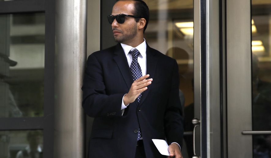 FILE - In this Friday, Sept. 7, 2018, file photo, former Donald Trump presidential campaign foreign policy adviser George Papadopoulos leaves federal court after he was sentenced to 14 days in prison, in Washington. Papadopoulos, who triggered the Russia investigation, is willing to testify before the Senate intelligence committee, Thomas Breen, his lawyer, said Wednesday, Sept. 12, 2018. (AP Photo/Jacquelyn Martin, File)